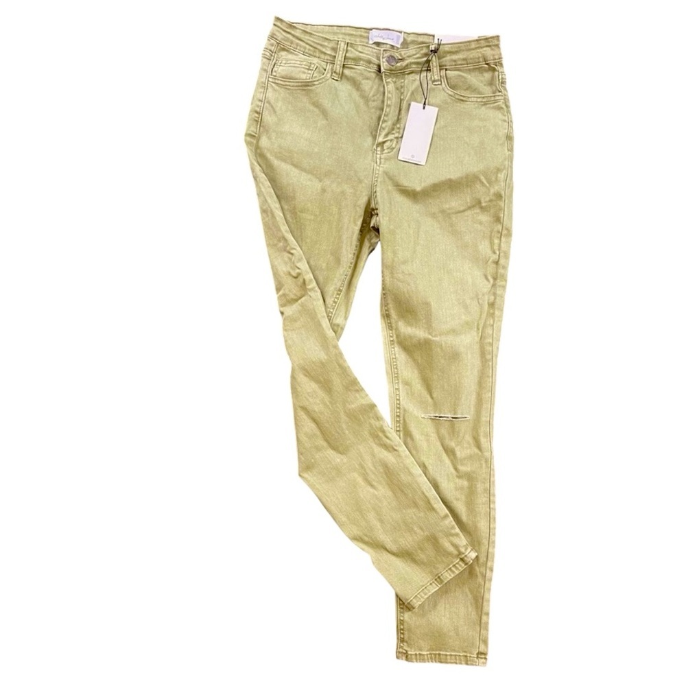 Jeans by Jelly.  Size 9 with cuts on knees. NWT